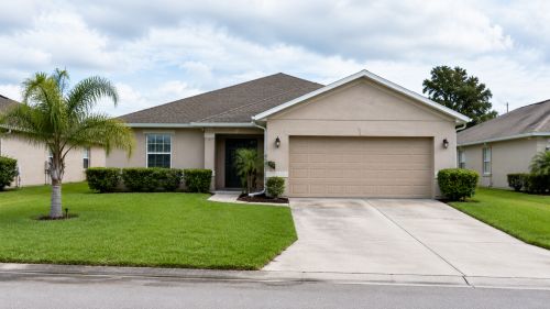 Single-family Florida suburban rental home representing landlord liability insurance and asset protection for real estate investors